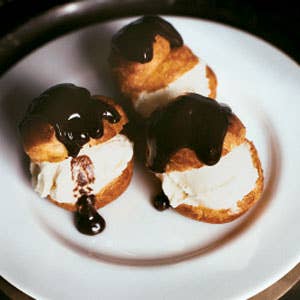 Small Pastry Puffs with Chocolate Sauce and Vanilla Ice Cream (Profiteroles au Chocolat)