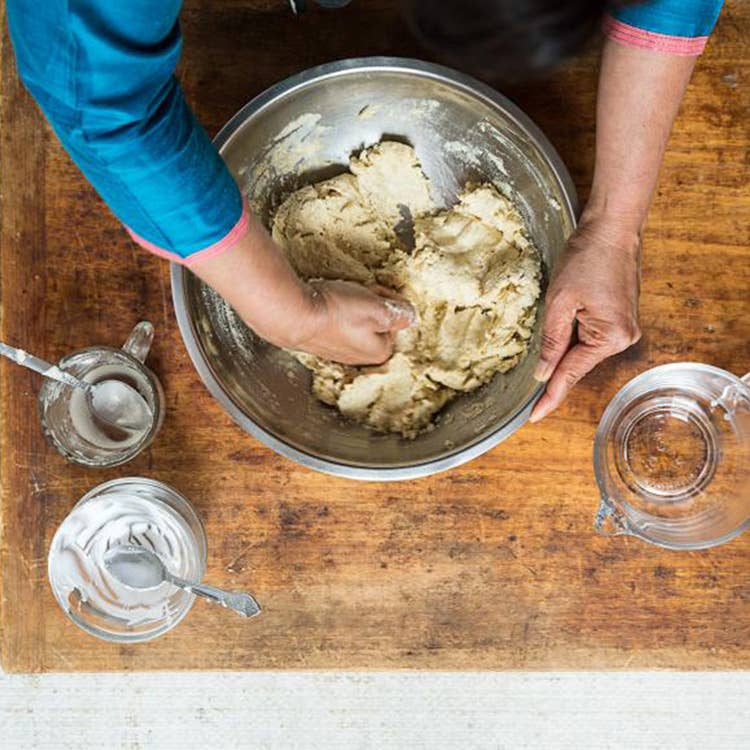 mixing dough for naan