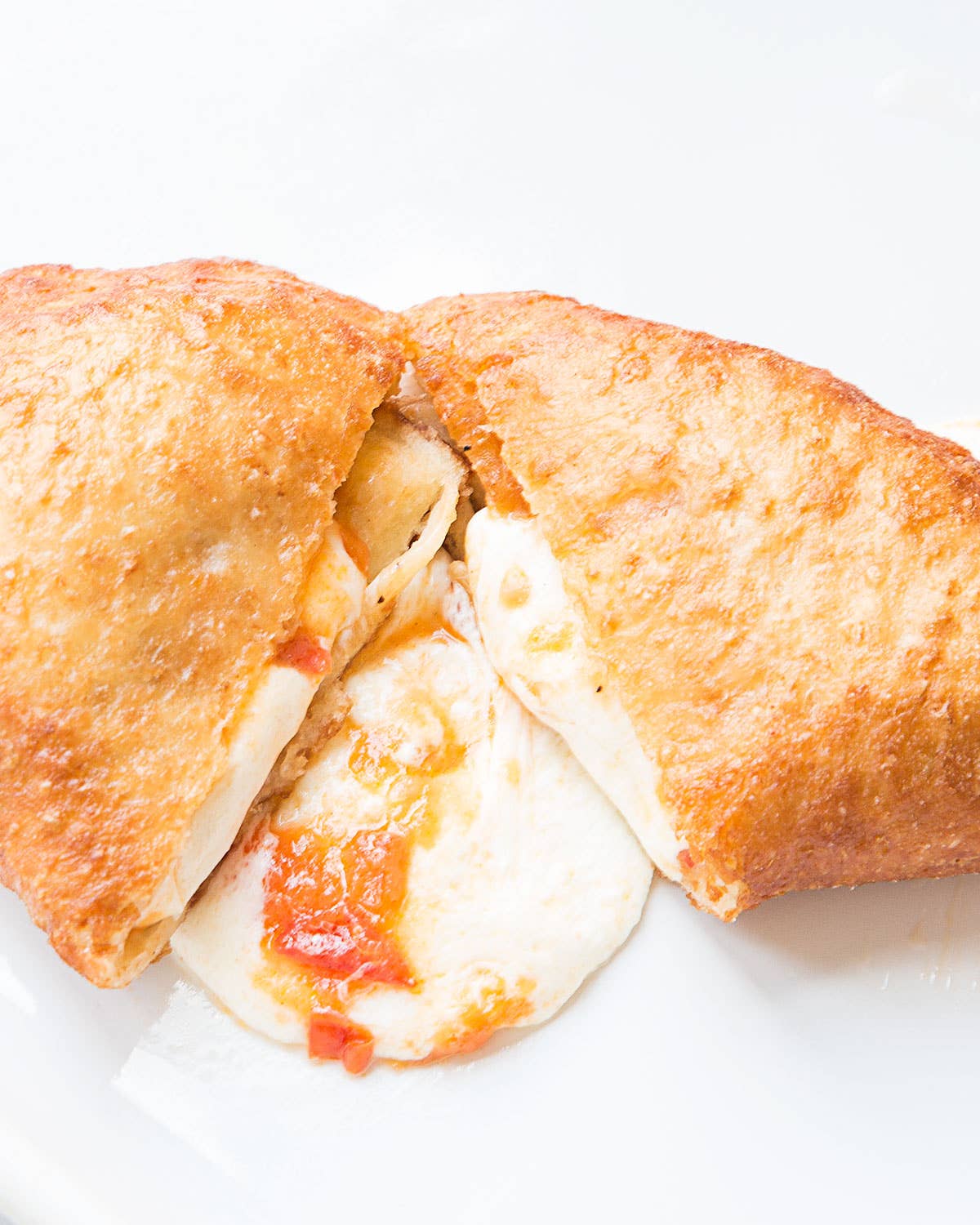This Fresh Tomato and Mozzarella Panzerotti Recipe is What We Need and Deserve