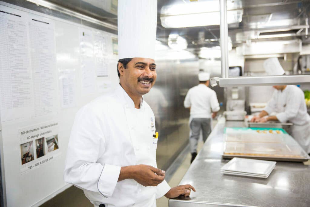 Chef Raj cooks beside his team every day