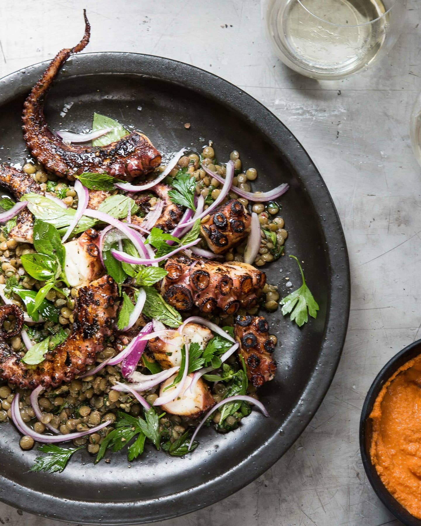 GRILLED OCTOPUS WITH GREEN LENTILS AND ROMESCO