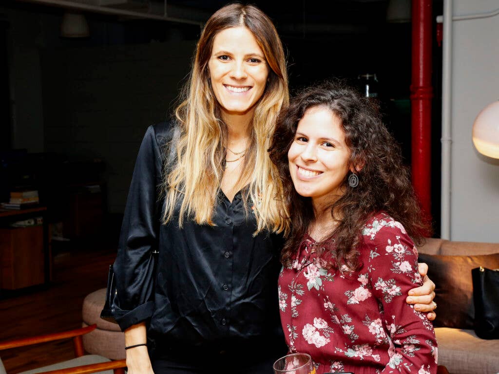 Television personality Eden Grinshpan and Becca PR's Liz Pierson are all smiles during cocktail hour.