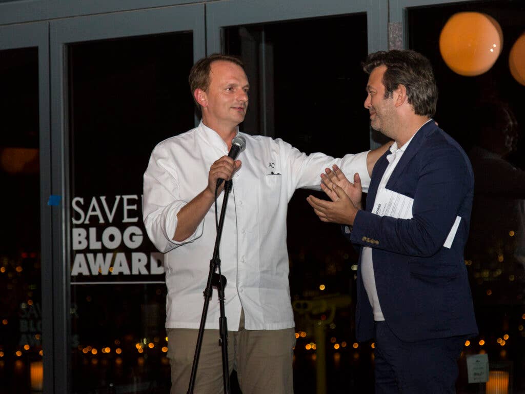 Editor in Chief Adam Sachs thanks Chef Andrew Carmelini