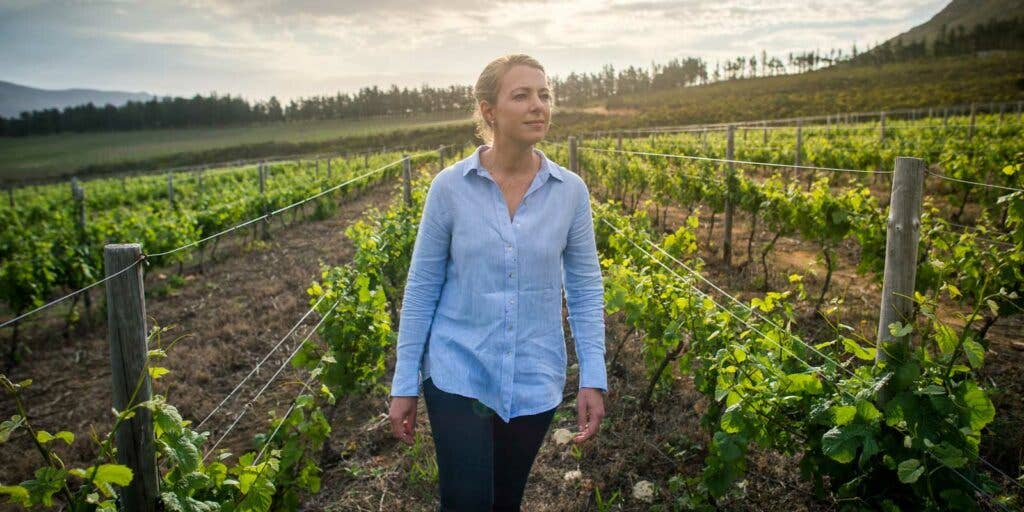 Corlea Fourie checks out her vines.