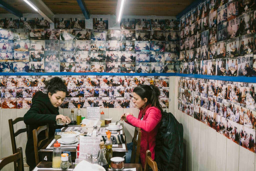 Visitors enjoy a meal at Muftak Dili.