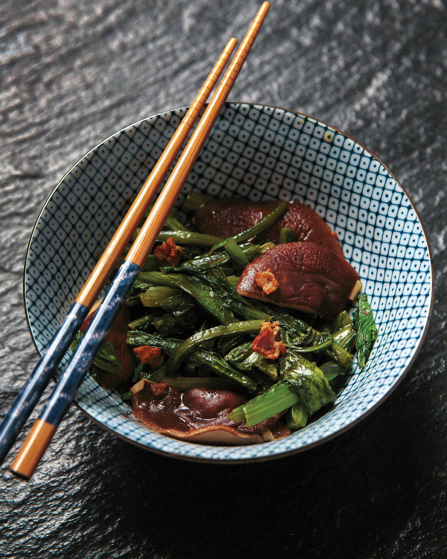 Stir-Fried Celtuce Tops with Mushrooms (Xianggu Chao Wosun Ye)