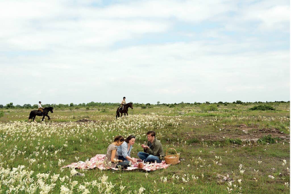 friends picnicking and horseback riding on the Great Alvaret