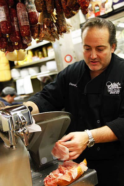 httpswww.saveur.comsitessaveur.comfilesimport2009images2009-12634-mike27s_deli_owner_slicing_prosciutto_400.jpg