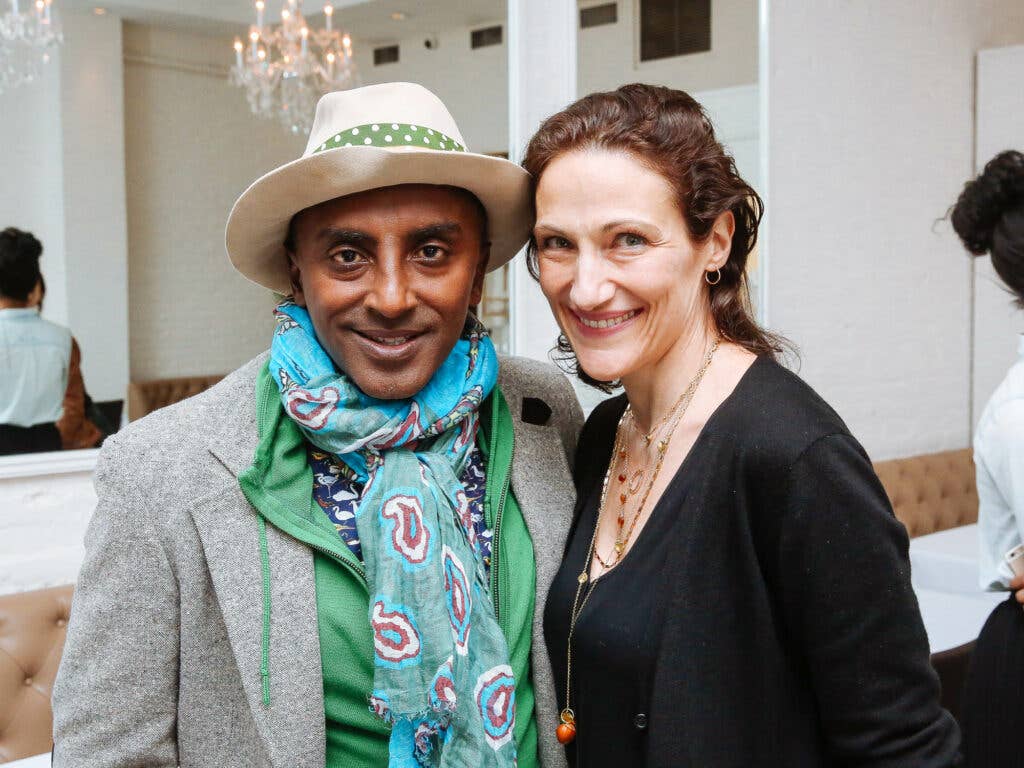 Chef Marcus Samuelsson and Pavia Rosati of Fathom pose for a photo at Fusco.