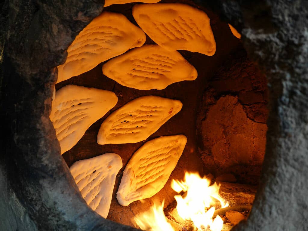 traditional naan in a tandoor