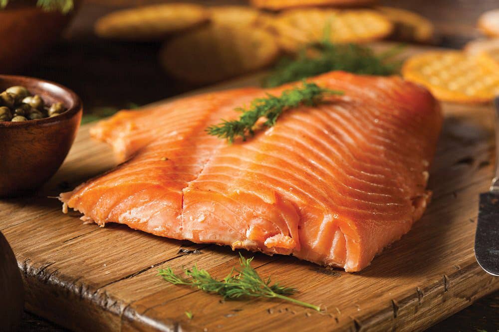 grilled salmon on wooden board