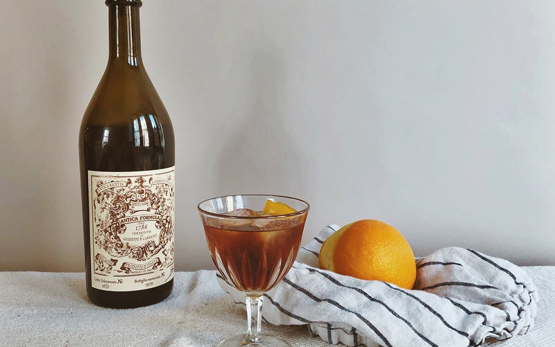 Carpano Antica Formula on the table with fruit