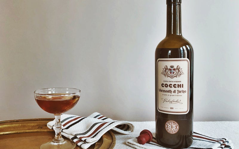 Cocchi Storico Vermouth di Torino on table with towels