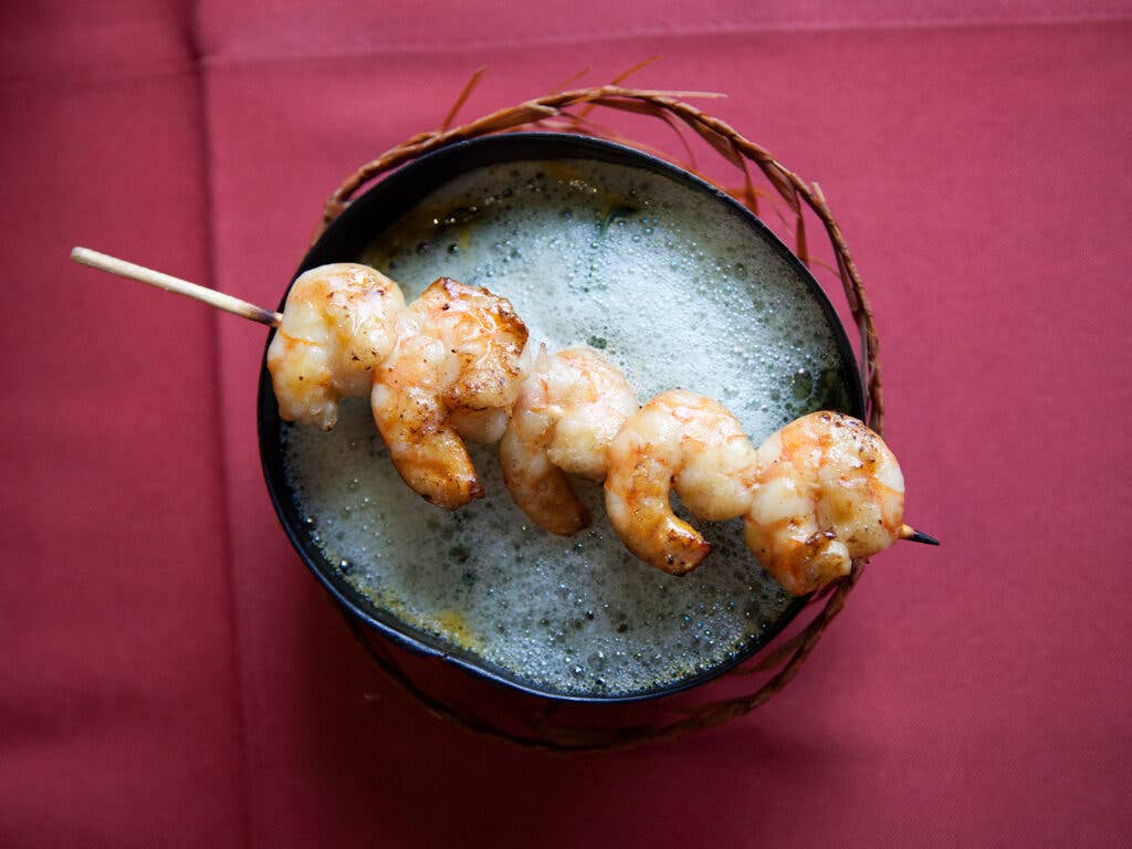 Tacacá with skewered shrimp