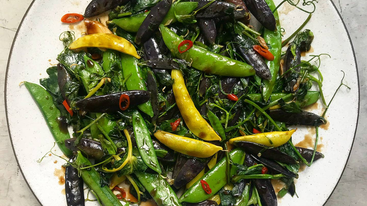Two Pea Stir-Fry with Greens Stir-fried peas and pea shoots
