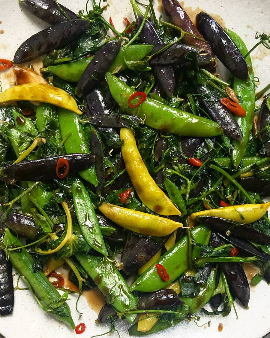 Two Pea Stir-Fry with Greens Stir-fried peas and pea shoots