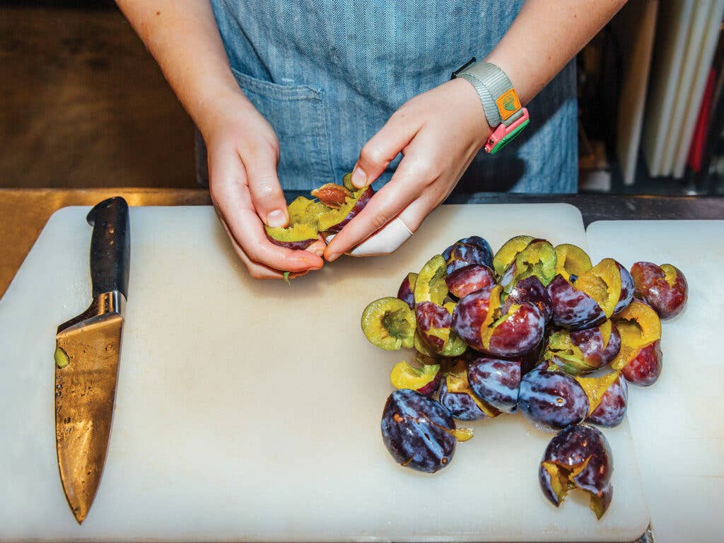 Lawlor cutting fruits on cutting board