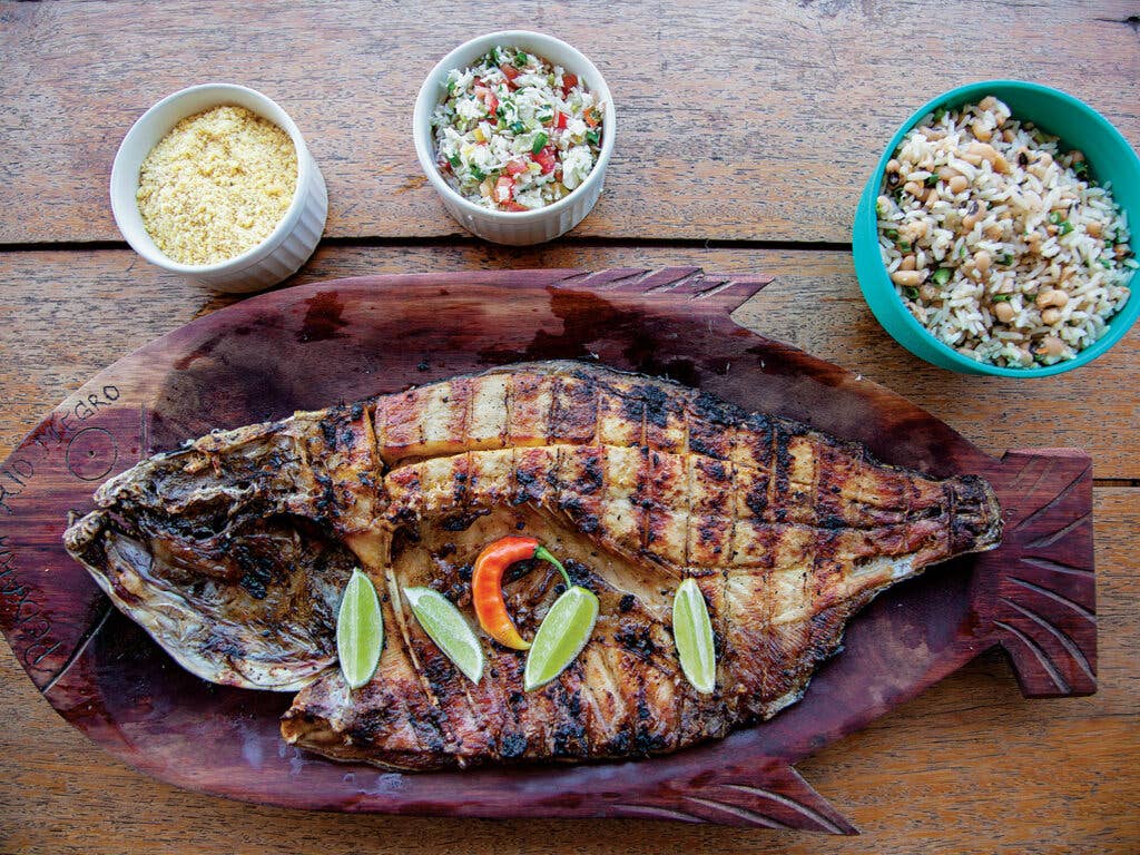 A dish of tambaqui fish seasoned with peppers