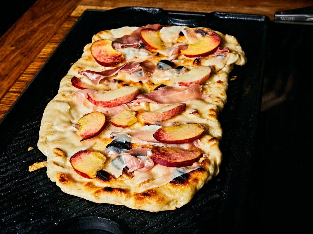 Grilled Pizza with Peaches, Prosciutto, and Arugula