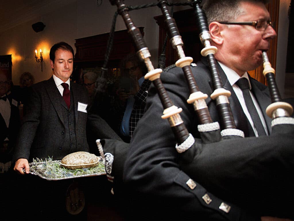 A heaping haggis is presented on a silver platter at one of Scotland’s annual “Burns’ Suppers” to celebrate the poet Robert Burns.