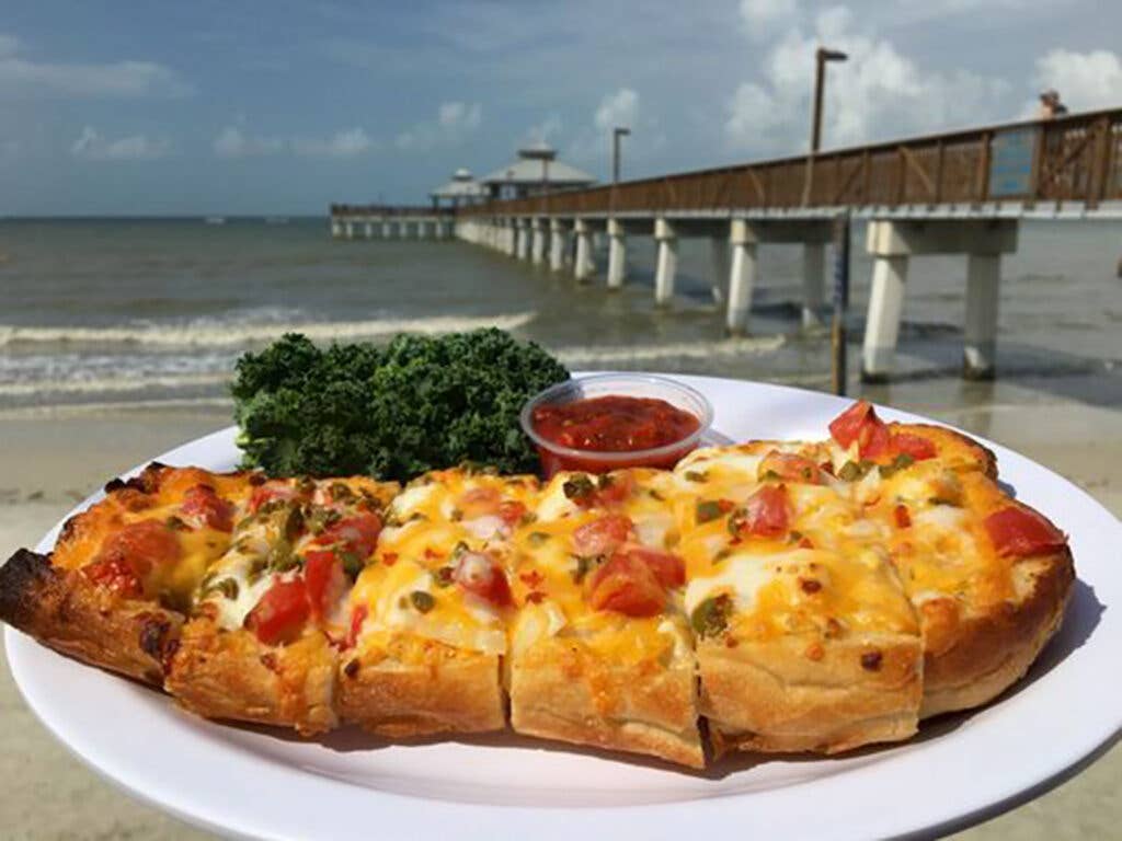 Artisan French bread on beach.