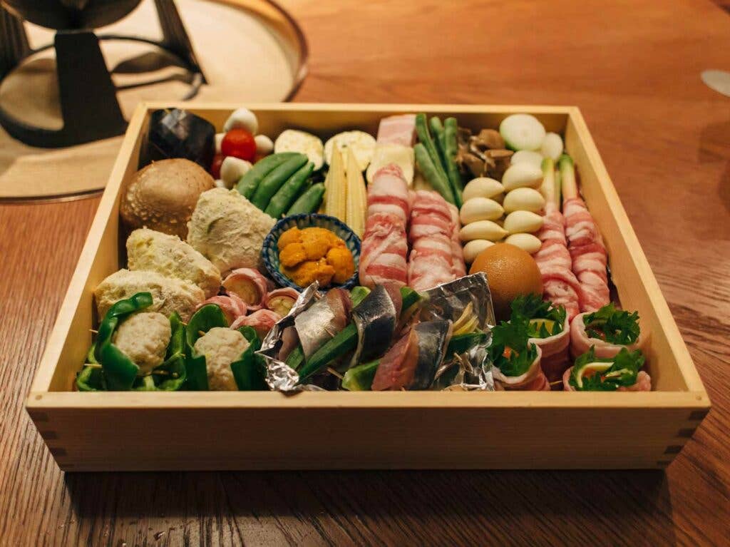 At Yamamotoya, the seasonal tempura of the day is presented to diners in a box in lieu of a regular menu.