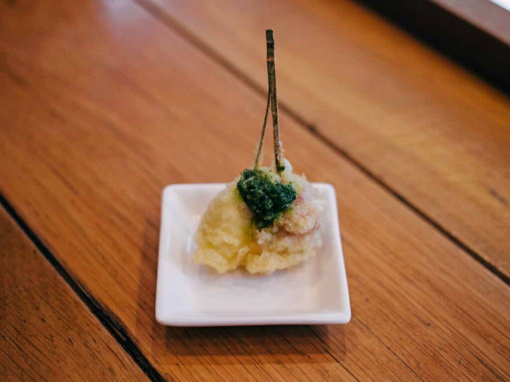 Caprese tempura, topped with fragrant basil sauce.
