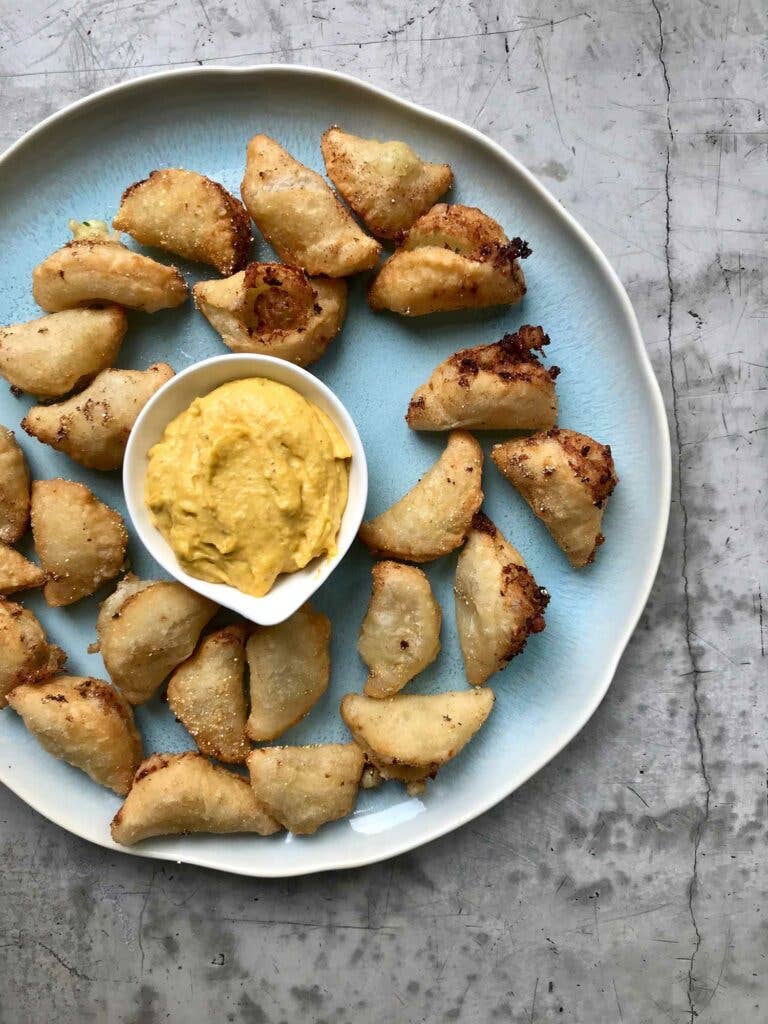 Golding’s riff on classic Jamaican shrimp patties stuffed with curried shrimp and roasted plantains.