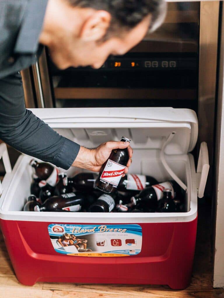 Red Stripe Jamaican lager in a red cooler.