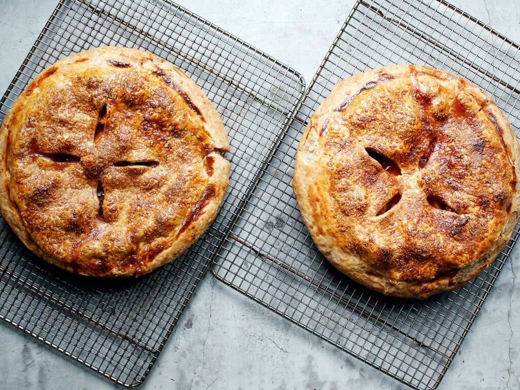 Pies on wire cooling racks.