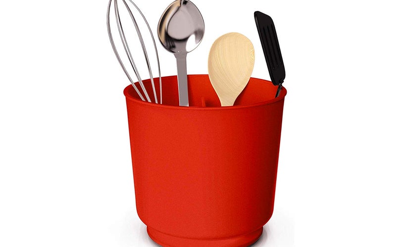 Large red utensil crock