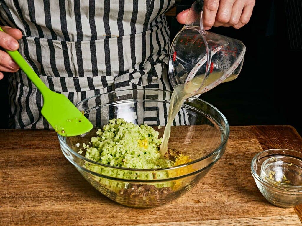 Fresh citrus brightens the peppery, pungent vinaigrette.