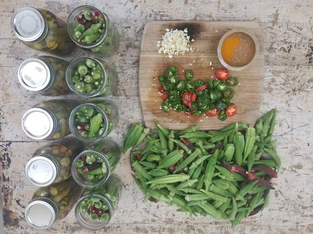 Jars of okra pickles in progress.