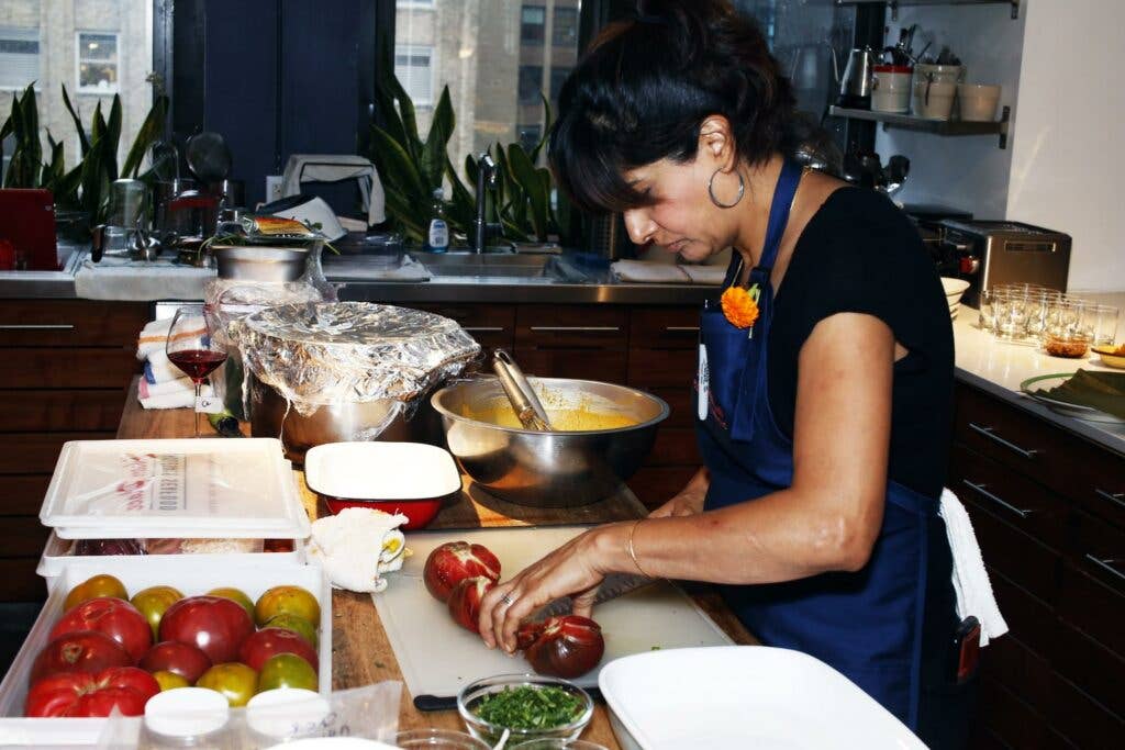 Chef Cheetie Kumar preparing heirloom tomatoes