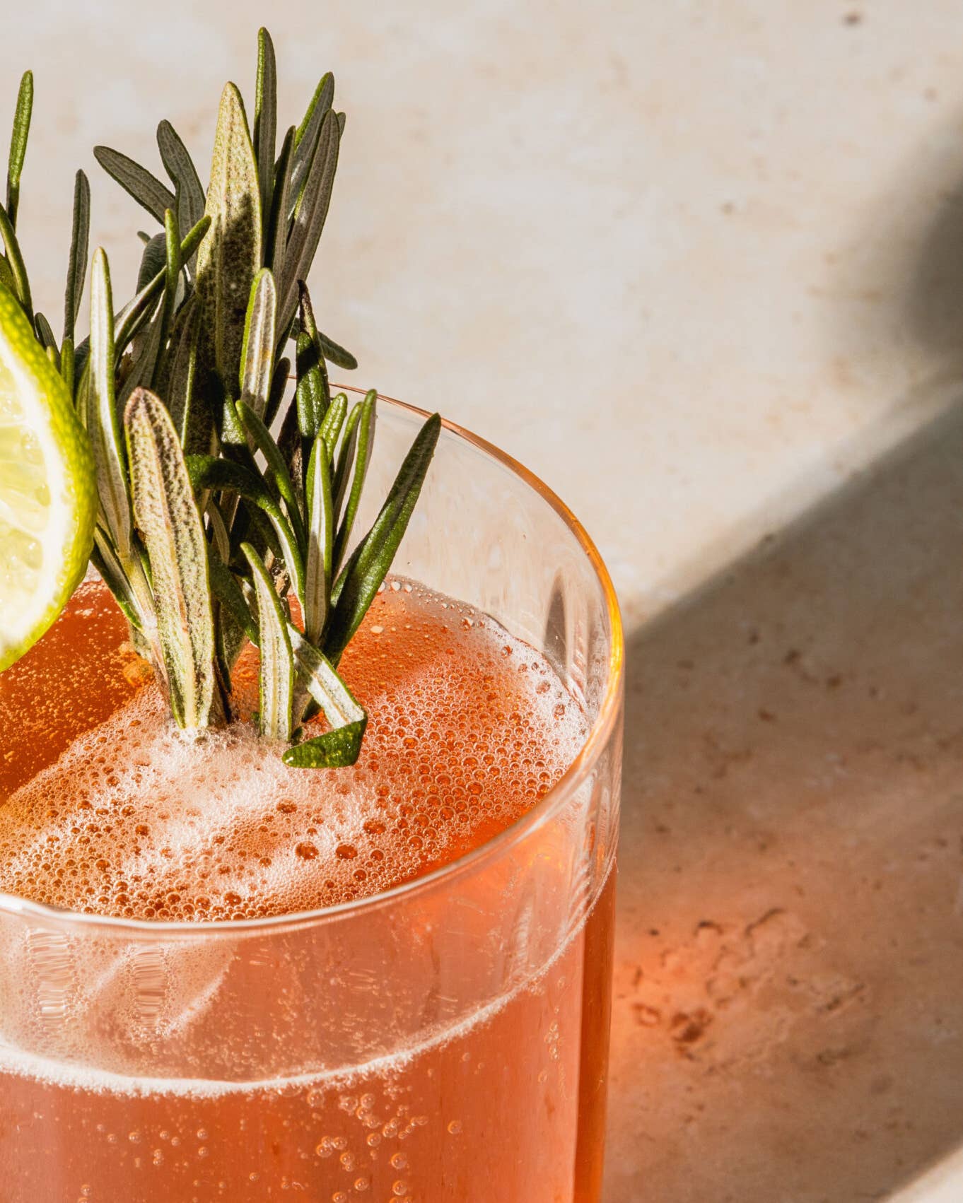 cocktail with sprig of rosemary