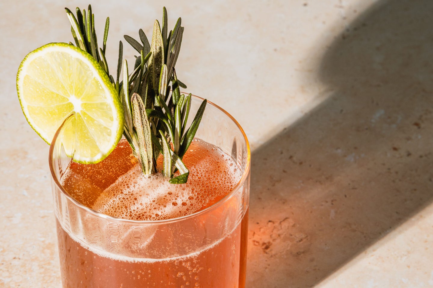 cocktail with sprig of rosemary