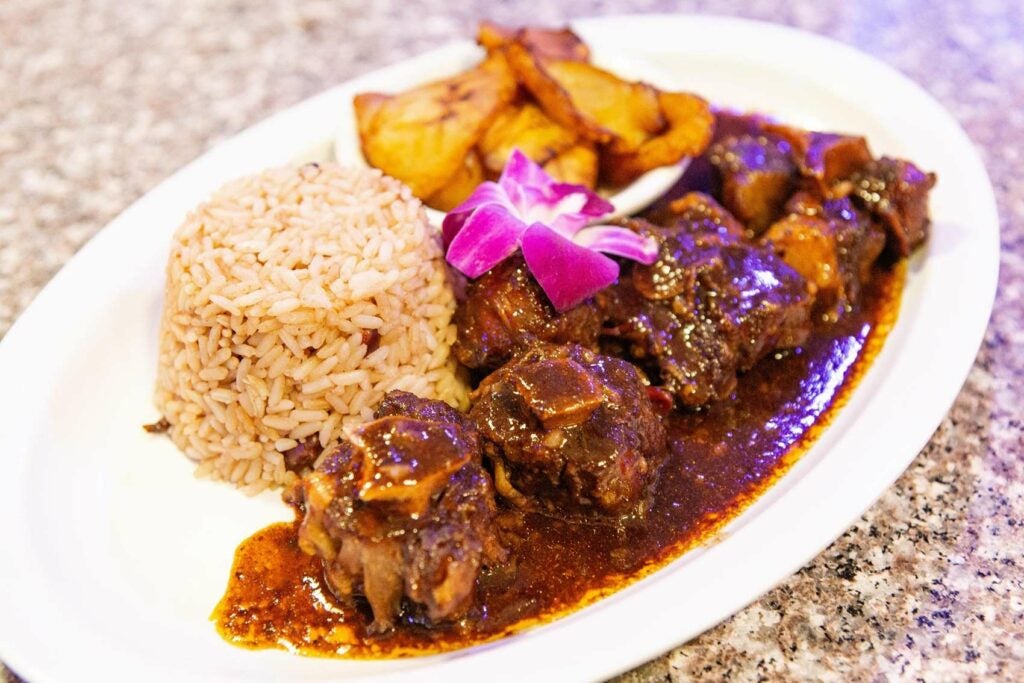 Oxtail with Fried Plantains at Montego Island Grill in Virginia Beach