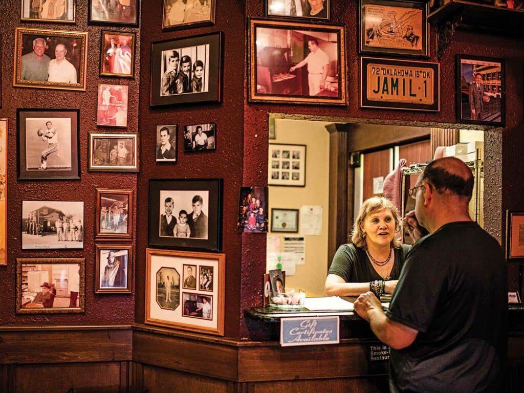 Jennifer Alcott greets a customer.
