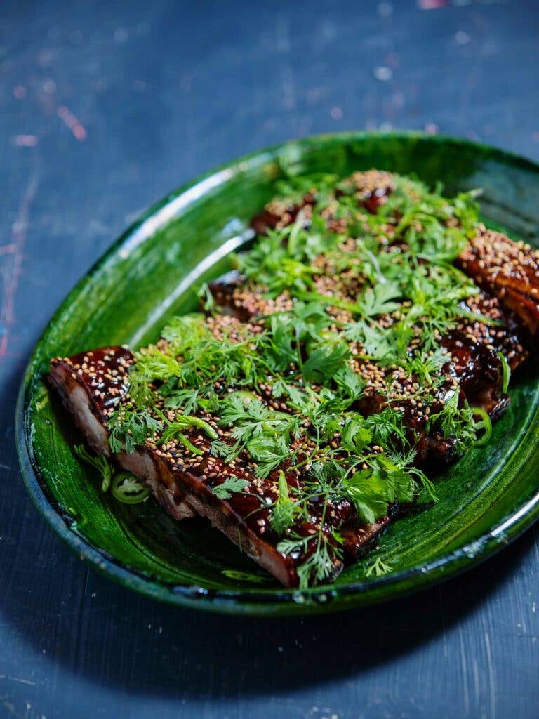 Cosme chef Estefania Brito’s riff on Shepherd’s ribs marinated with sriracha, palm sugar, serrano chiles, cilantro, green onions, and sesame seeds.