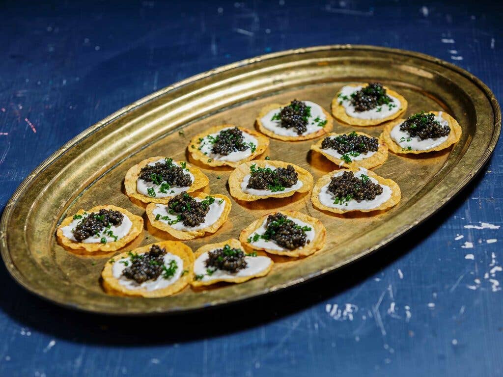 Tostadas with Keluga caviar from Regalis Foods, crema, and chives.