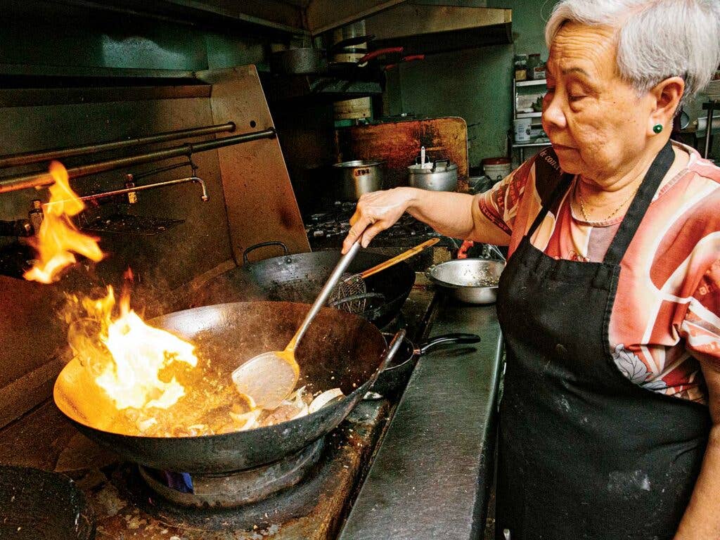 Bac Sau in the kitchen at Hoàng Gia.