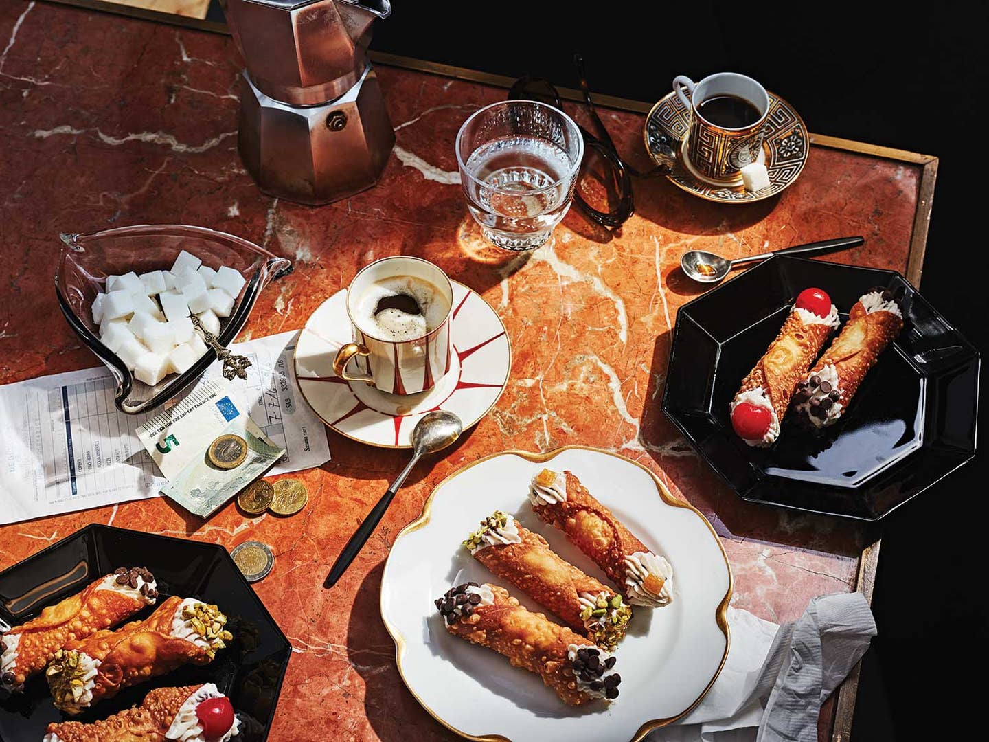Cannolis on Sicilian spread.