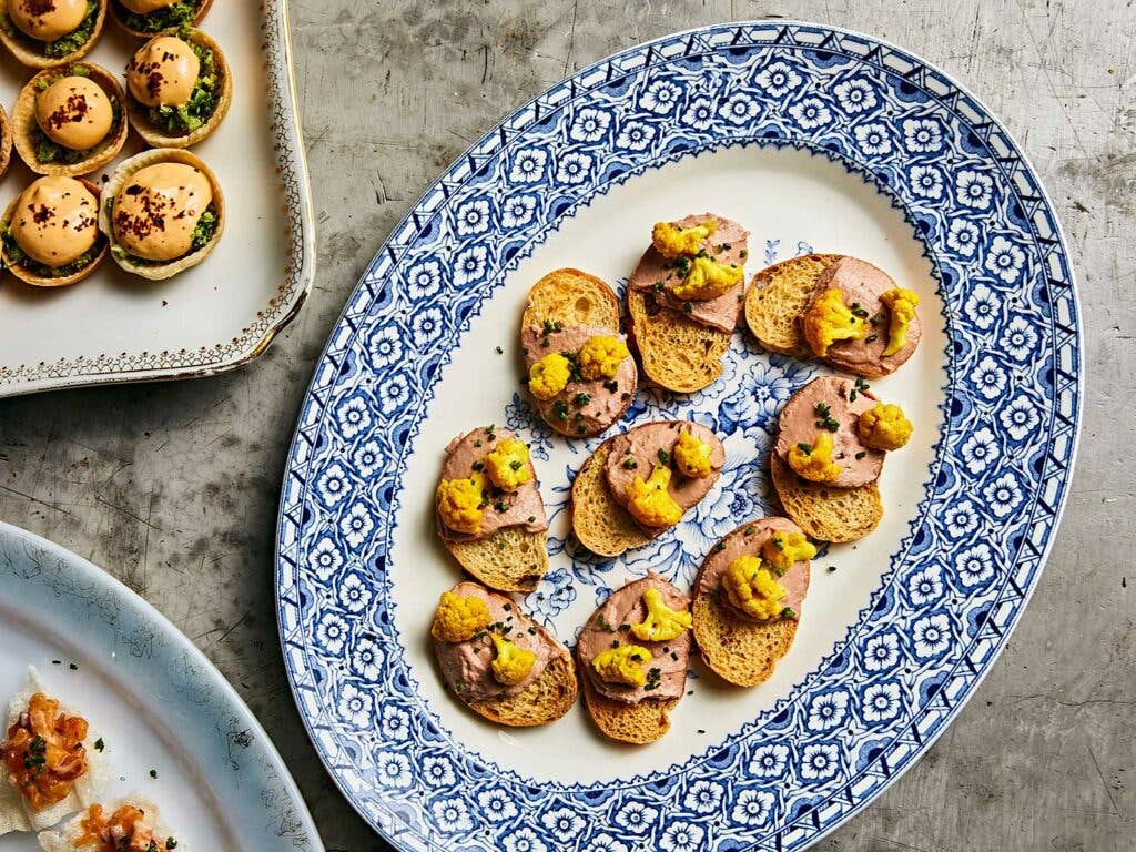 Duck liver mousse crostini with pickled cauliflower.