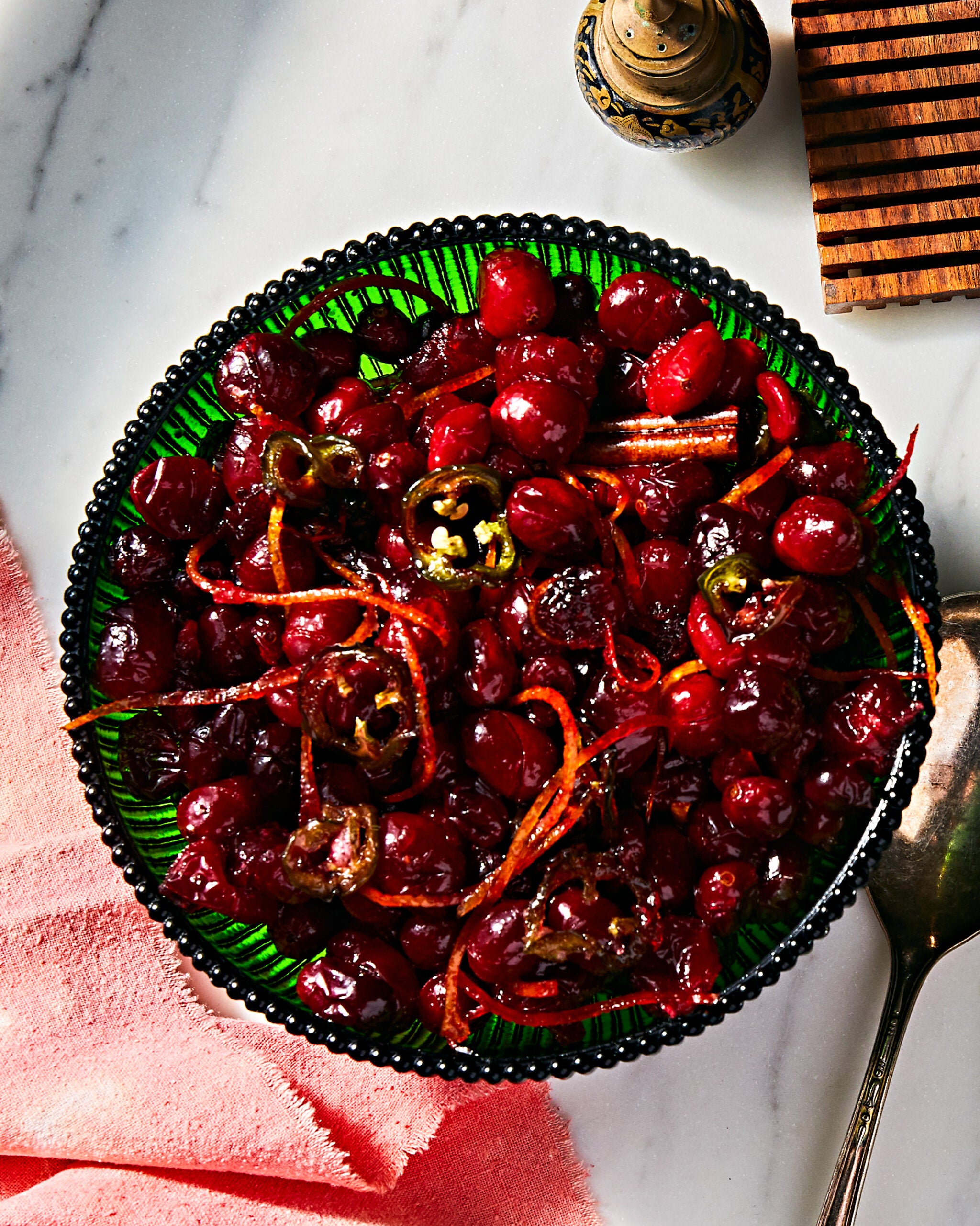 Roasted cranberry sauce in a green bowl