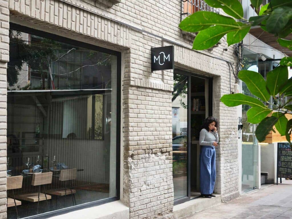 Woman standing outside the new Masala y Maiz, located in Mexico City’s Juarez neighborhood.