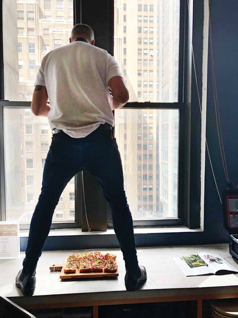 Thomas Payne takes photos at Saveur’s photo studio, also known as “the concrete ledge near the test kitchen.”