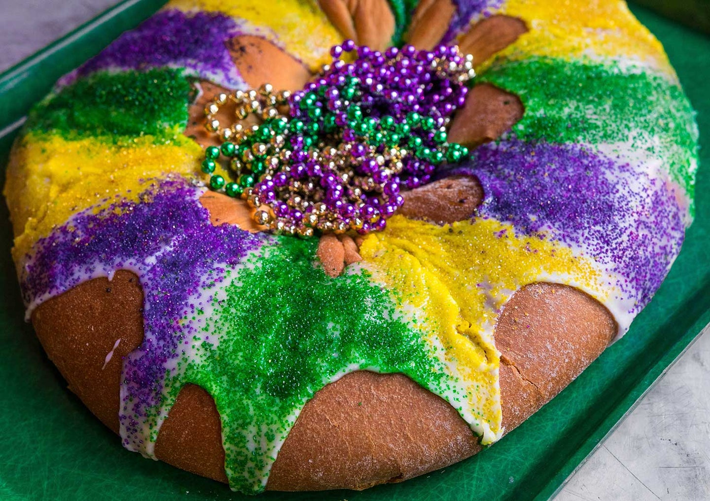 why is king cake important to mardi gras