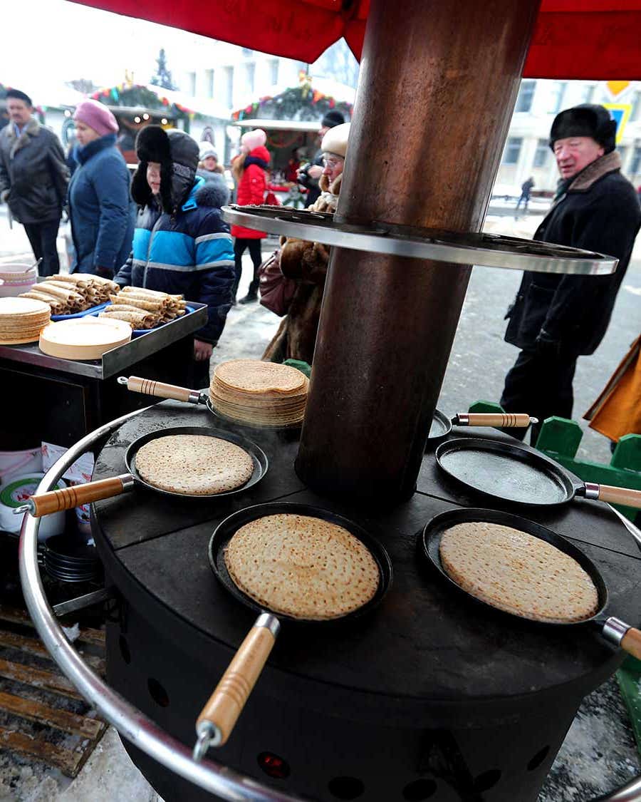 Maslenitsa: Russia’s Butter-Soaked Bacchanal Naked blini eaten warm with a variety of toppings such as sweet cheese and caviar.