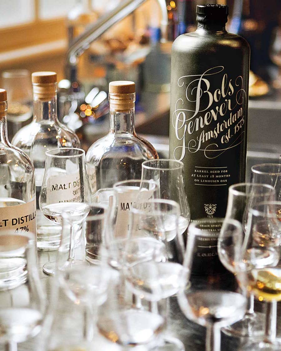 A bottle of Bols genever sits amid base spirits at the 355-year-old Amsterdam distillery.