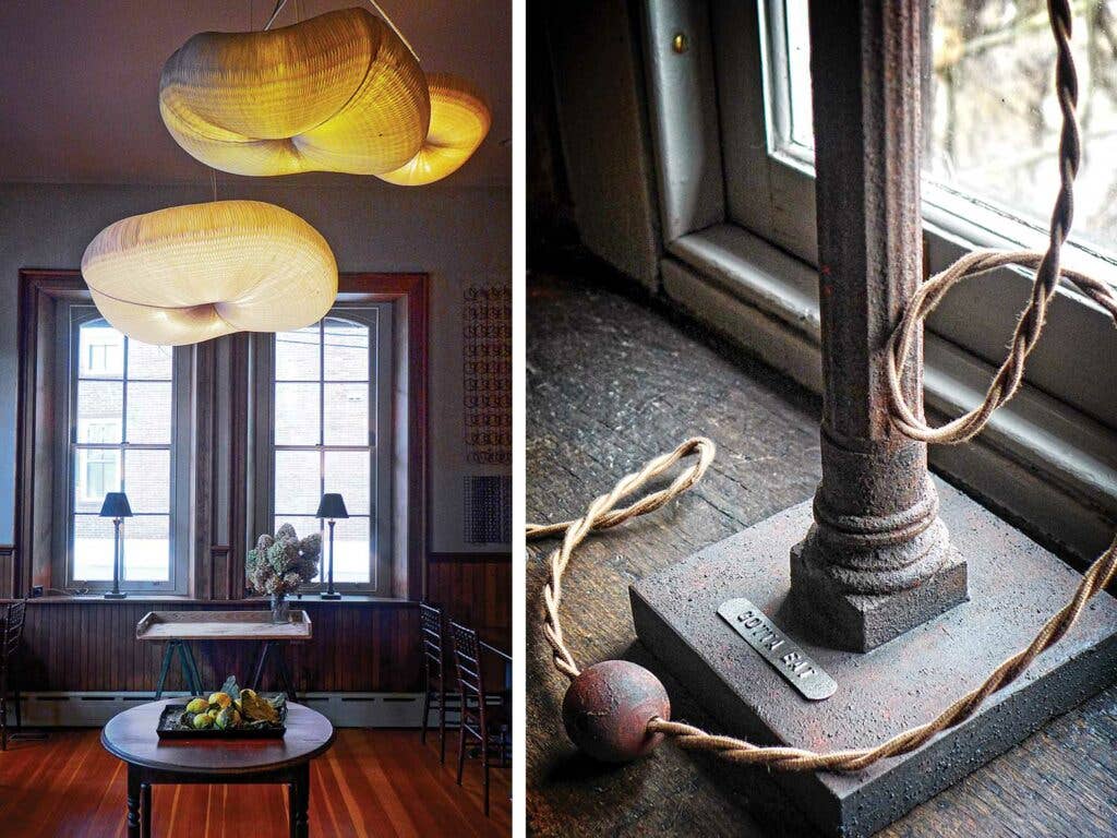 Cloud-like paper pendants, from the Japanese company Molo, strike a modern note in one dining room. The restaurant’s table lamps, with stamped tags spouting phrases like “Gotta Eat.”